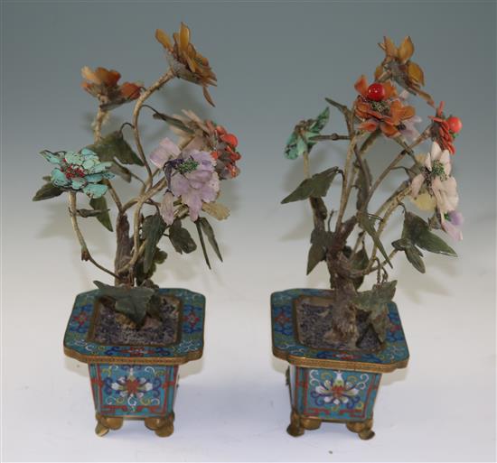 A pair of Chinese hardstone and coral mounted models of trees in cloisonné enamel jardinieres, early 20th century, 30cm, some losses